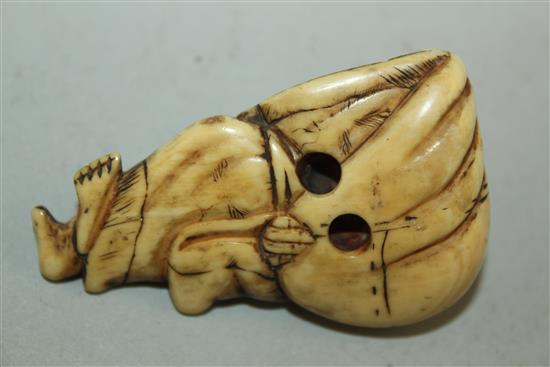 A Japanese ivory netsuke of Hotei, 18th / 19th century, 5.5cm, age cracks